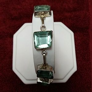 STERLING SILVER BRACELET WITH BLUE TOPAZ GEMSTONES